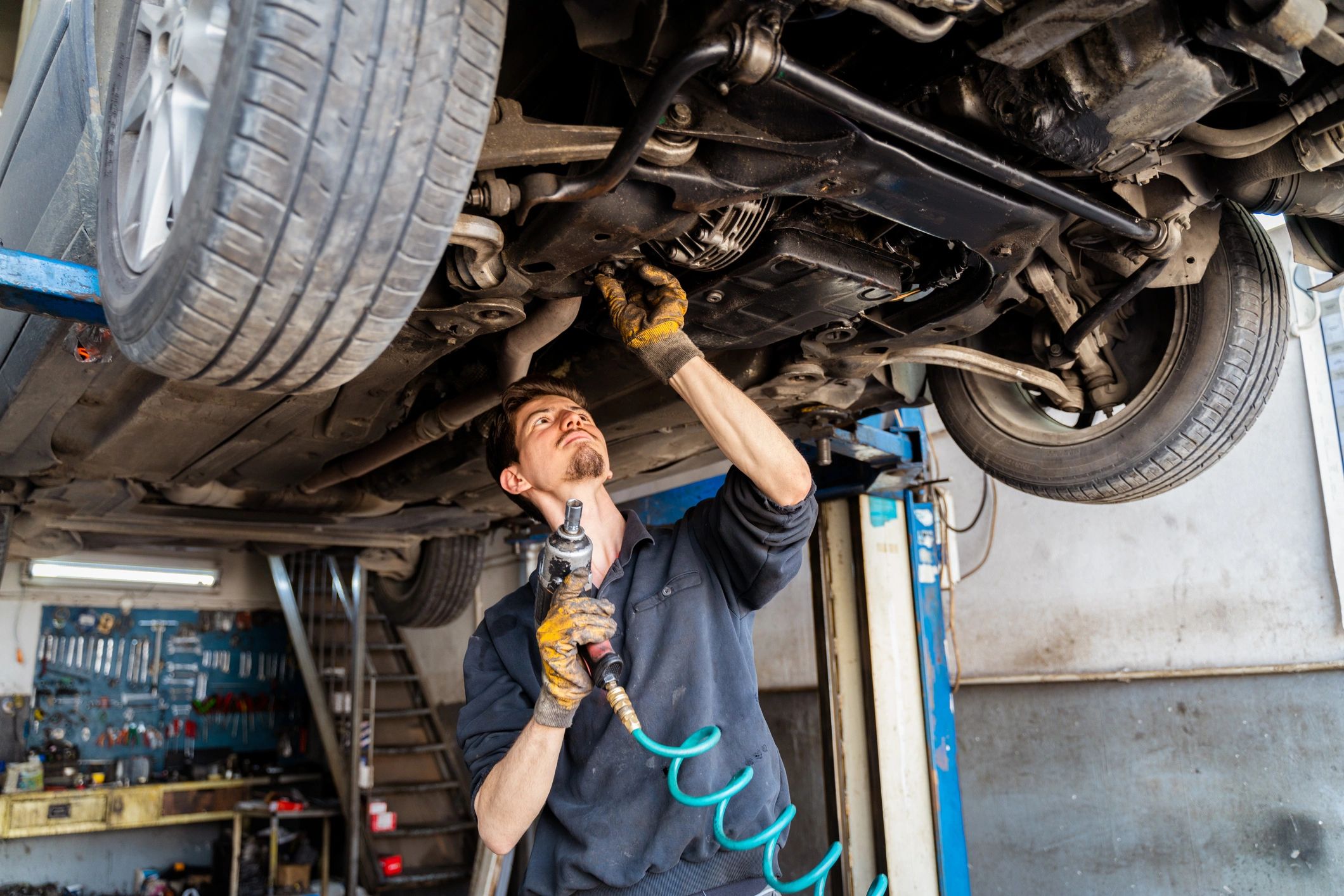 Technician installing a custom wheel
