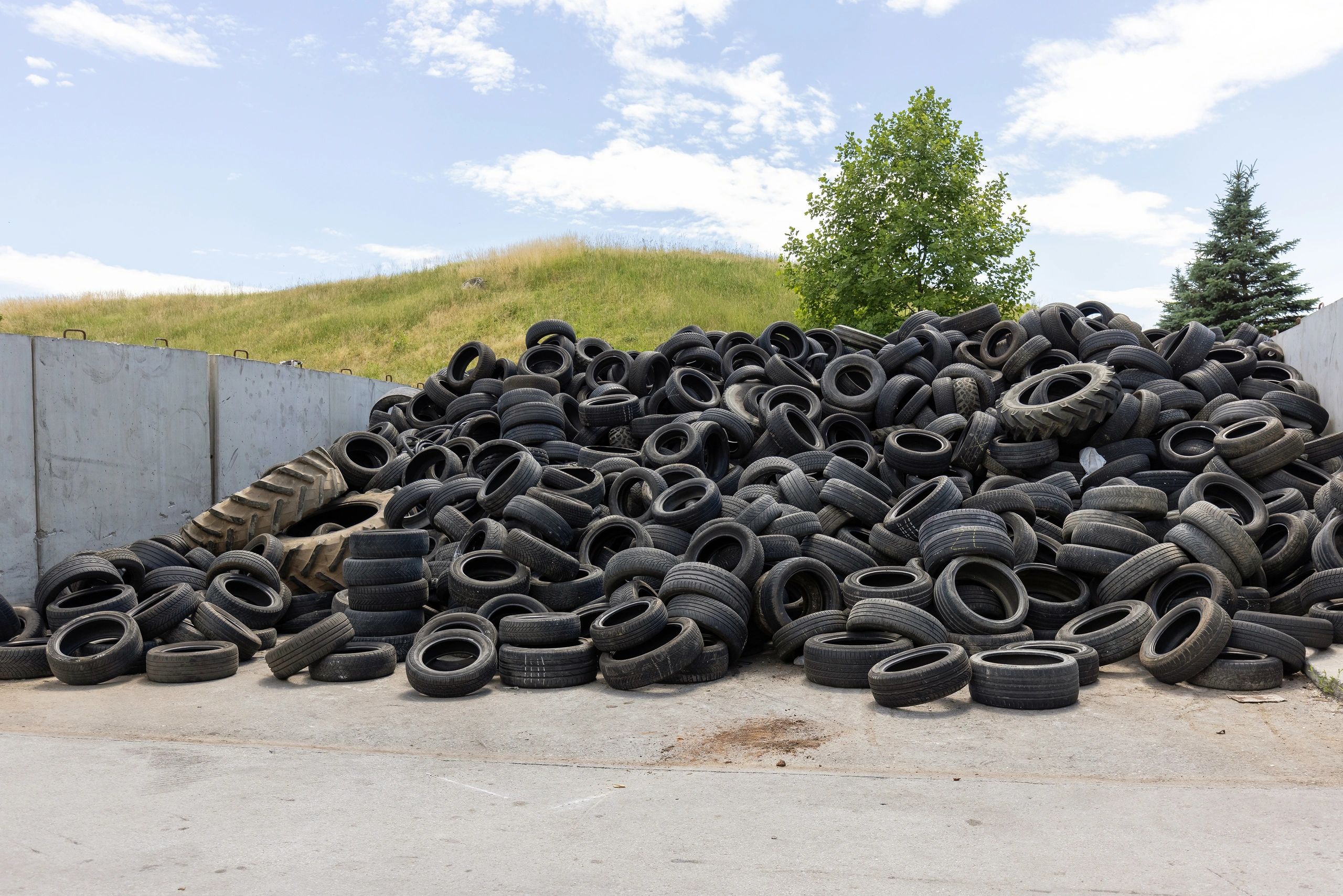 Stacked tires representing automotive products and inventory