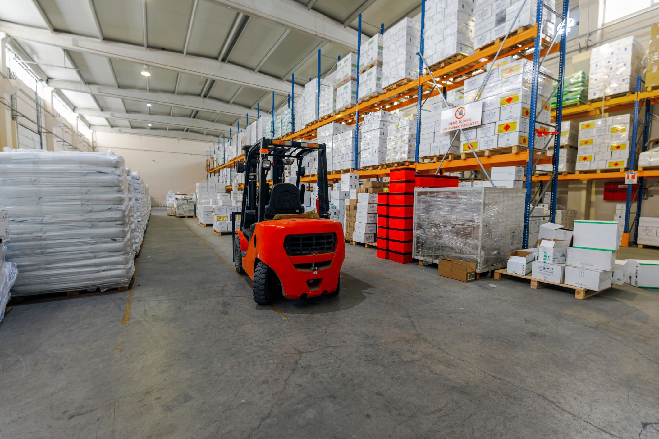 Warehouse aisle representing organized wholesale logistics
